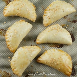 cheese bourekas recipe - So easy to make and delicious. The dough puffs up and becomes extra flaky with a smooth cheese filling that's amazing. Perfect appetizers for entertaining.